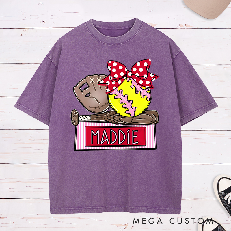 Personalized Softball Washed T-Shirt Design Featuring Custom Name Bright Softball Graphic and Playful Bow Accent