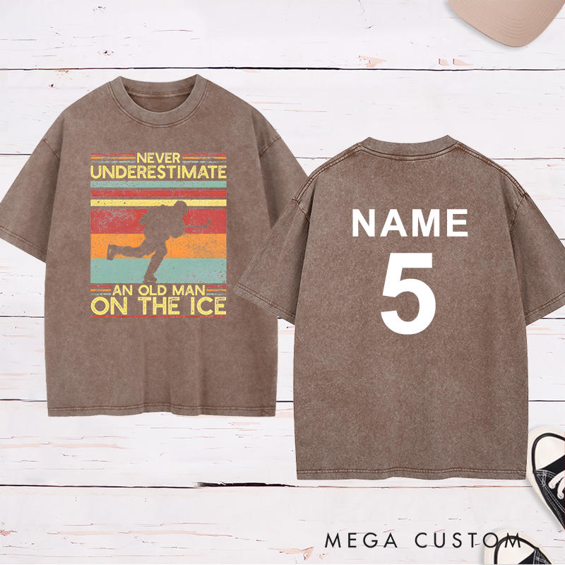 Personalized "Never Underestimate an Old Man on the Ice" Hockey Washed T-Shirt with Custom Name and Number