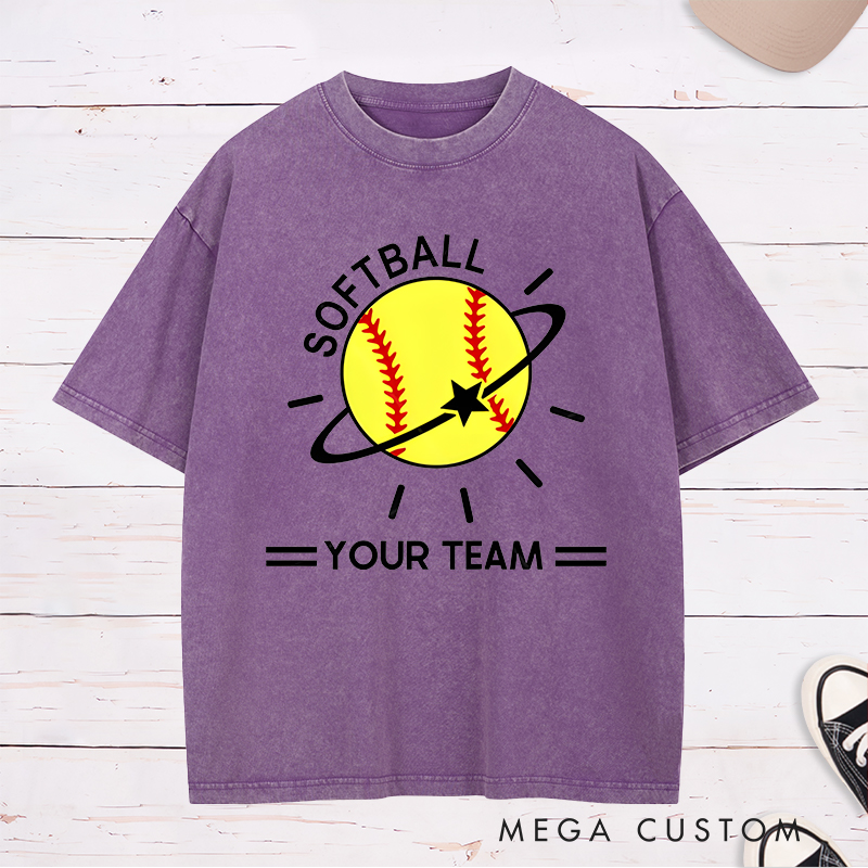 Personalized Softball Team Washed T-Shirt Design Featuring Customizable Team Name Vibrant Softball Graphic with Orbiting Star and Radiating Lines