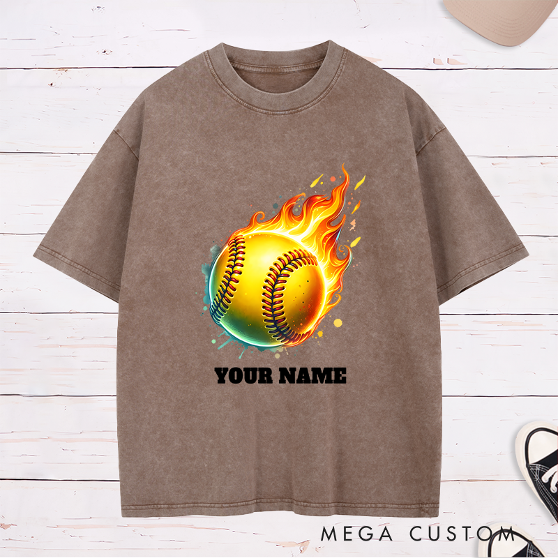 Personalized Fiery Softball Washed T-Shirt Design Customizable Name Featuring a Dynamic Flaming Softball Graphic Perfect for Teams and Players