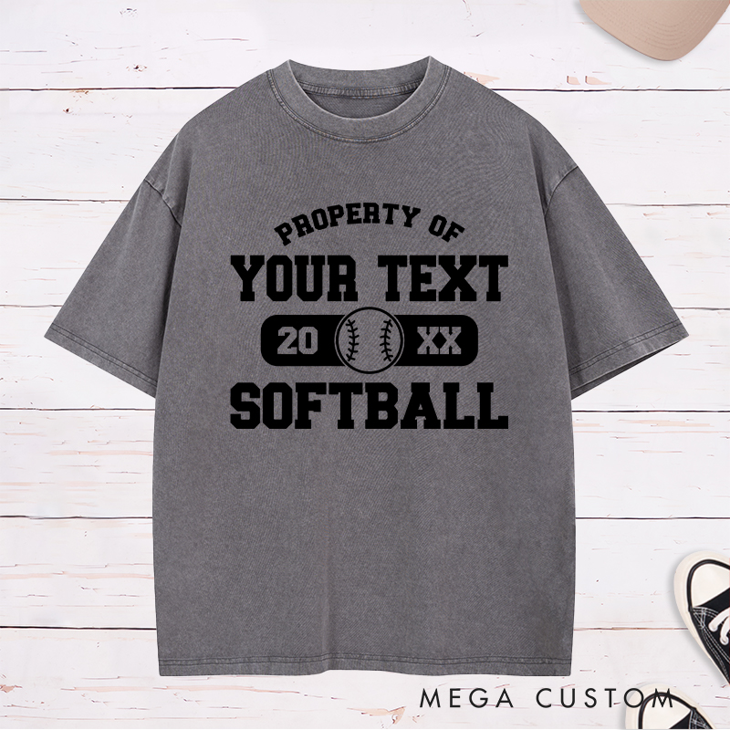 Personalized "Property of" Softball Washed T-Shirt Design Featuring Custom Text Year and Central Softball Graphic for a Classic Team Look