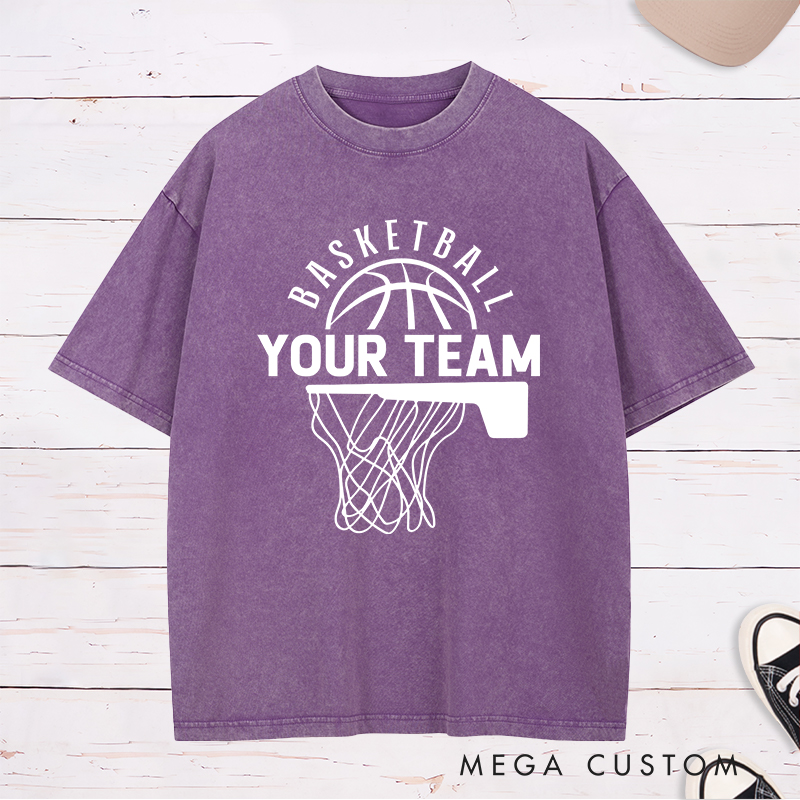 Personalized Washed T-Shirt Design Featuring a Basketball Hoop and Arched Basketball Text with a Customizable Team Name