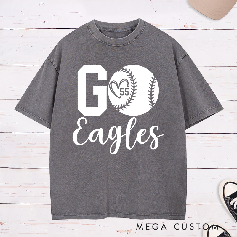 Personalized Softball Spirit Washed T-Shirt Design Featuring Bold "Go" Text Team Name in Elegant Script Heart-Shaped Player Number Inside a Softball Graphic Perfect for Fans and Players