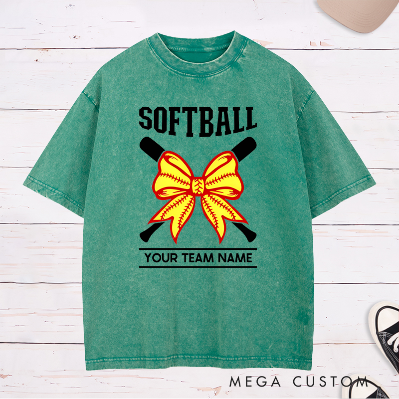 Personalized Softball Team Washed T-Shirt Design Featuring Customizable Team Name Striking Softball Bow Graphic and Crossed Bats