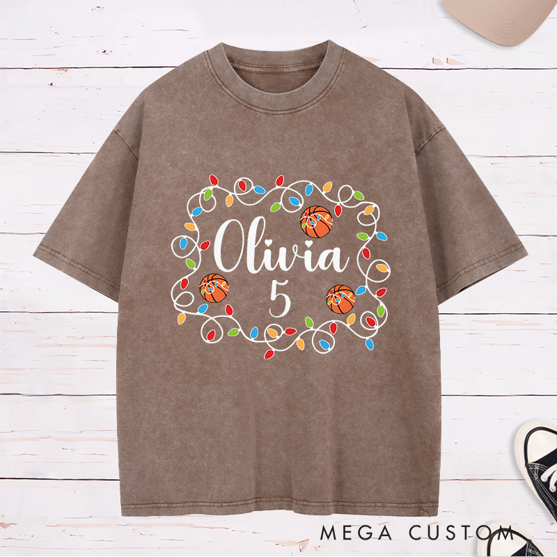 Personalized Washed Christmas T-Shirt with Custom Name, Number, Basketballs, and String Lights Design