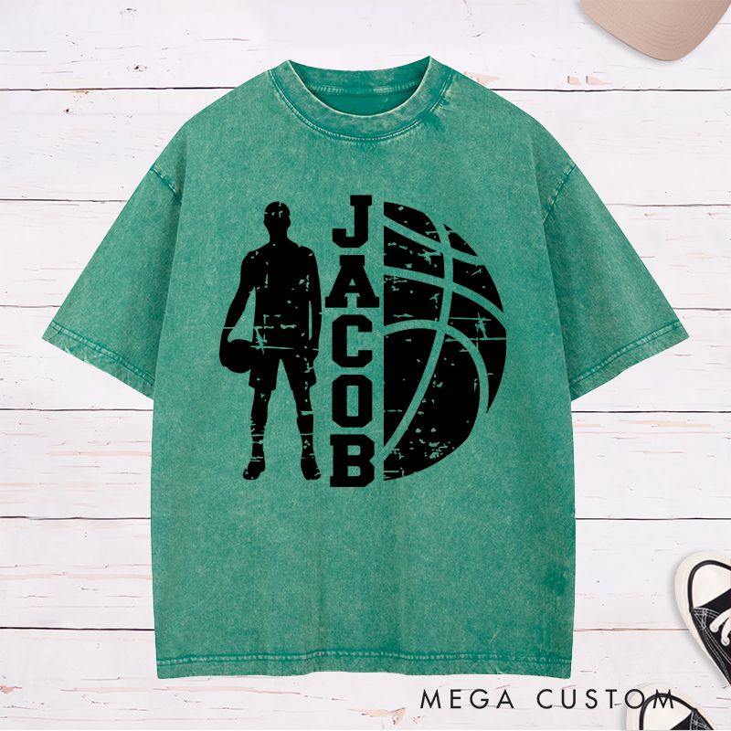 Personalized Washed T-Shirt Design Featuring a Distressed Basketball Player Silhouette with Customizable Vertical Name and Bold Graphic Style