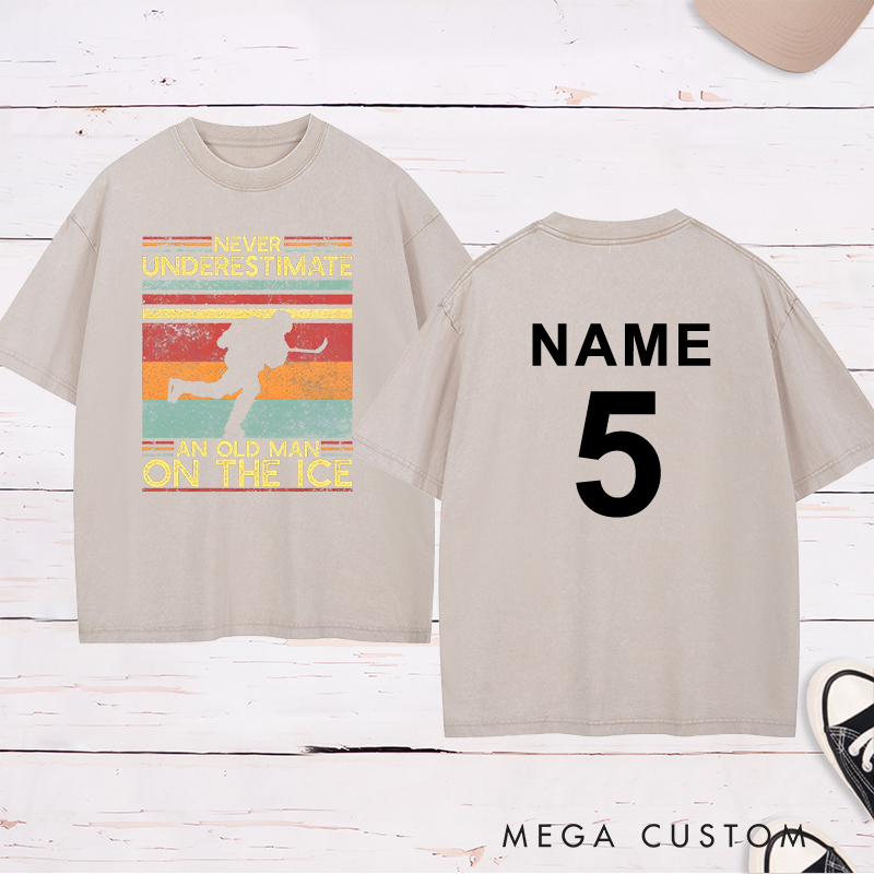 Personalized "Never Underestimate an Old Man on the Ice" Hockey Washed T-Shirt with Custom Name and Number