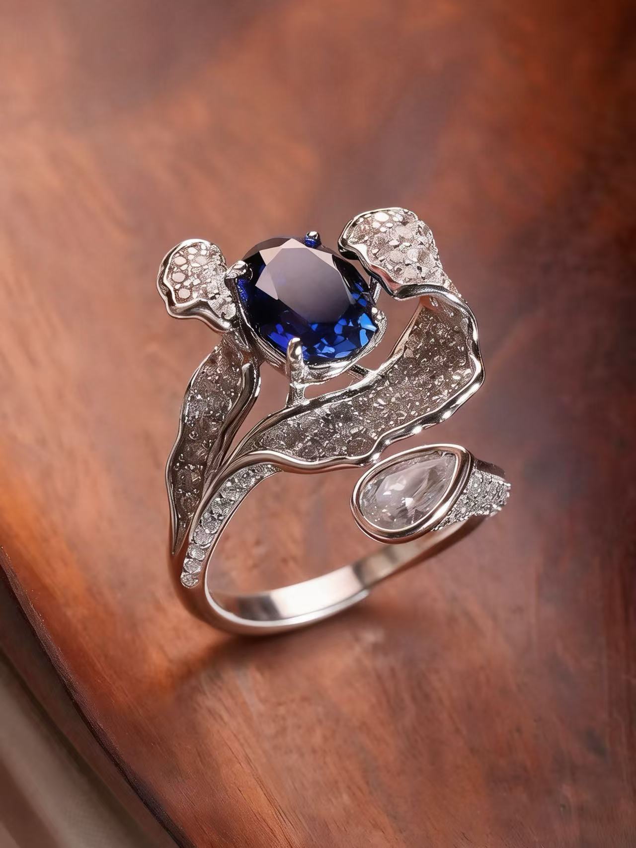 Oval Brilliant Cut Sapphire Ring - Ocean Petals 