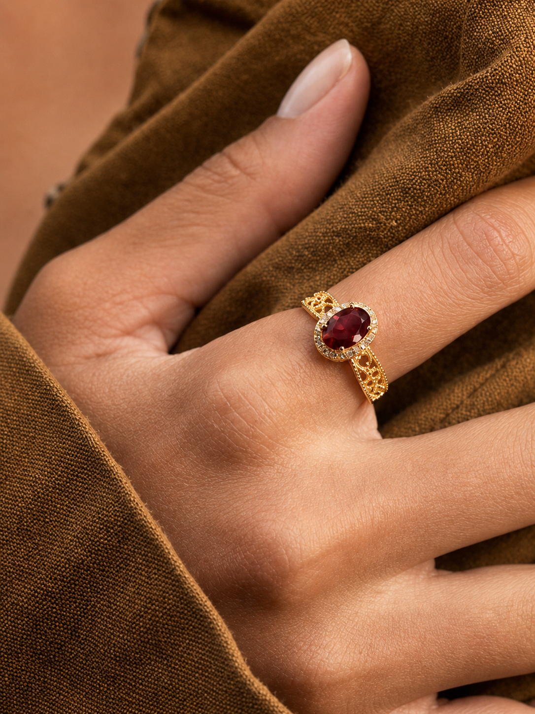 Garnet-Oval Brilliant Cut Ring-Gilded Filigree