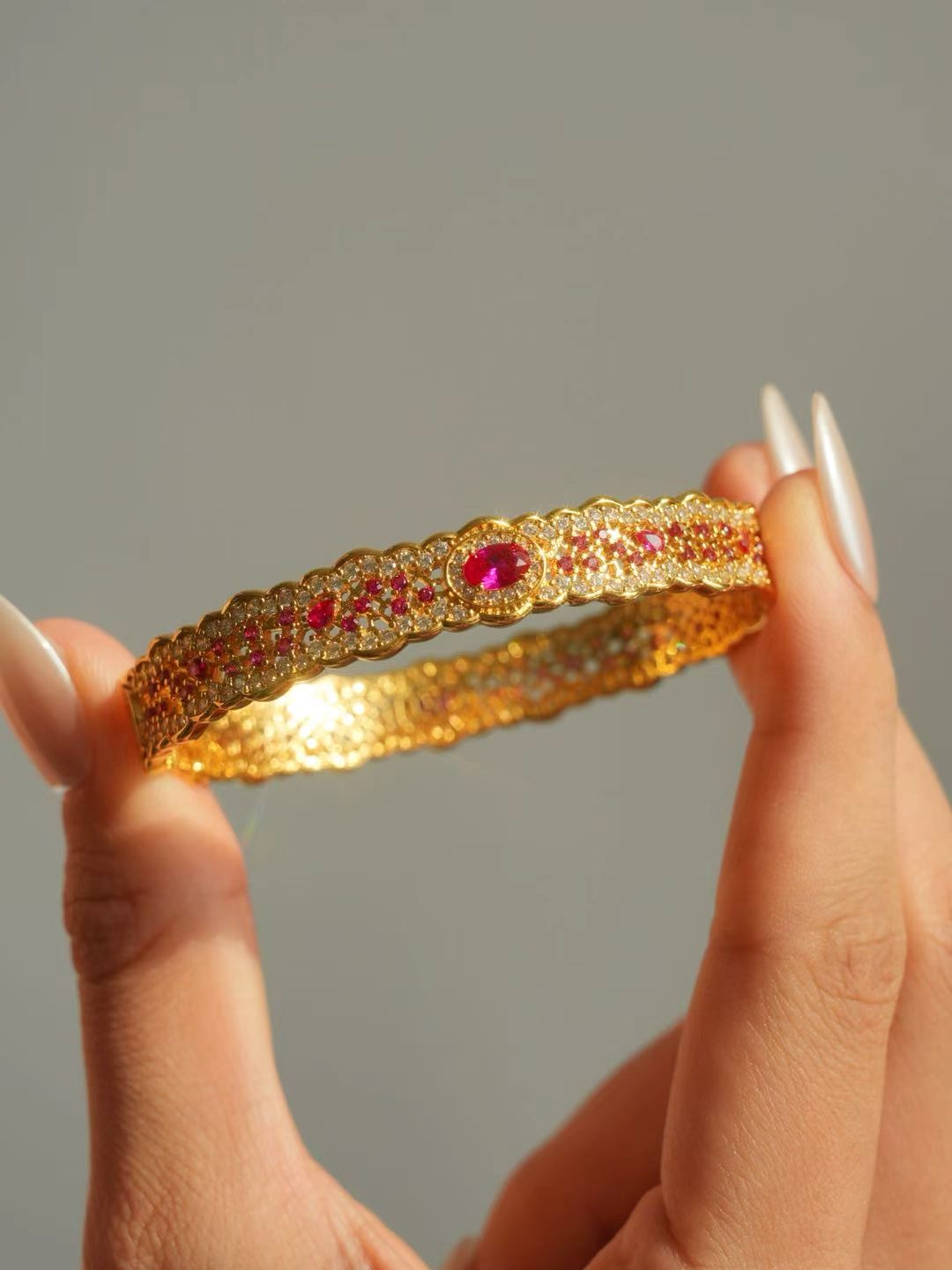Ruby-Oval Brilliant Cut Bangle-Filigree Ruby