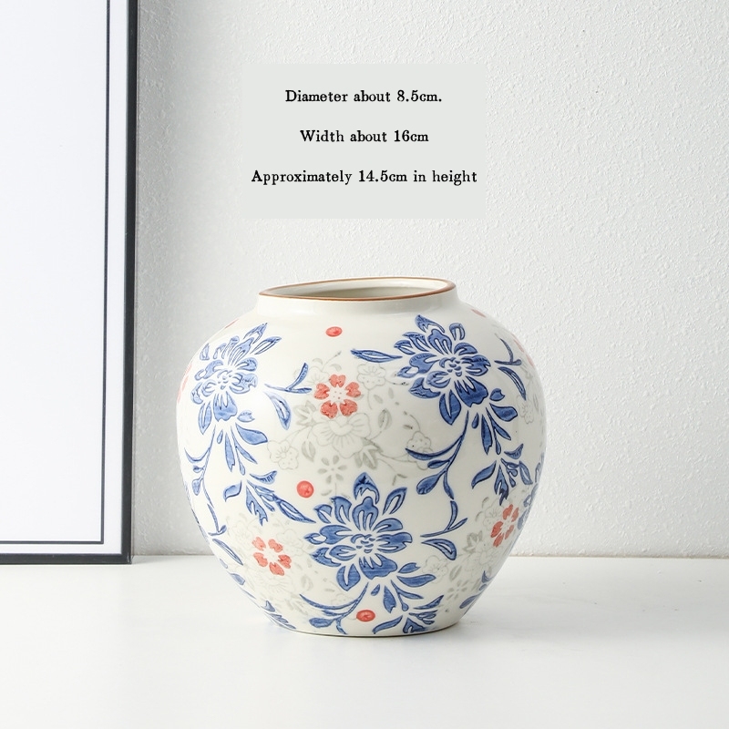 High-end retro-style new Chinese blue and white porcelain vase three-piece set for living room and dining room, floral arrangement, home decoration.