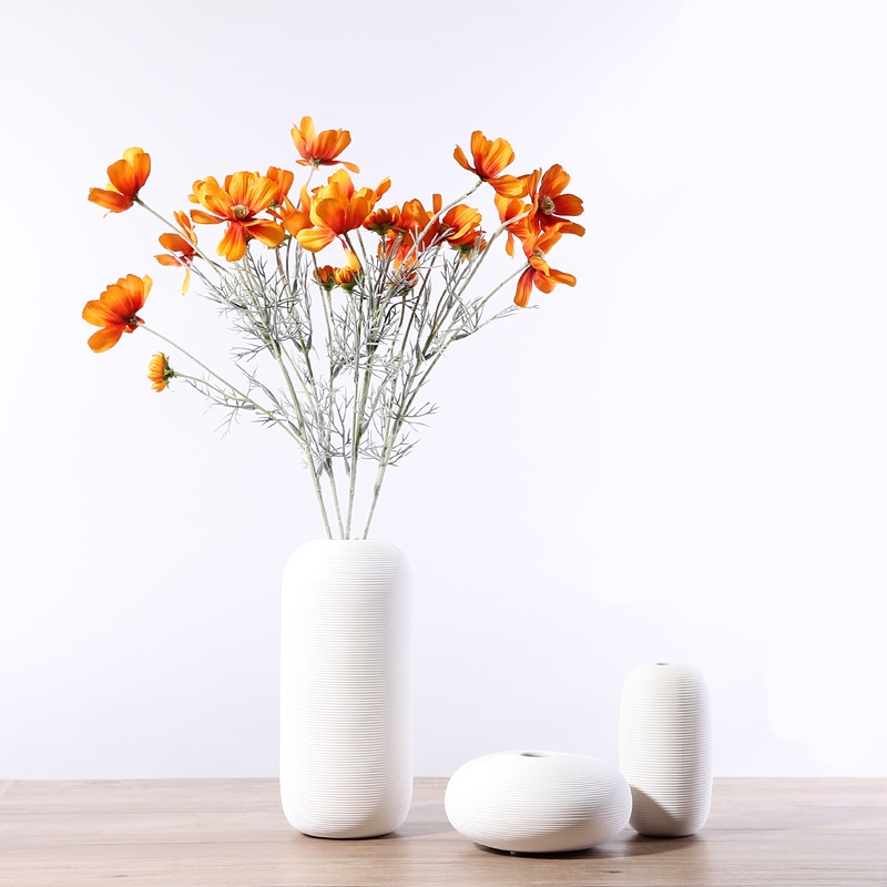 Three-piece set of ceramic white vases as decorative ornaments for living room and home decoration crafts