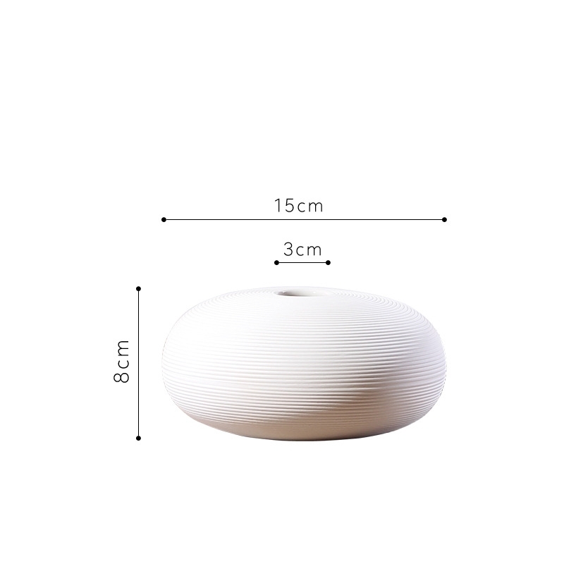 Three-piece set of ceramic white vases as decorative ornaments for living room and home decoration crafts
