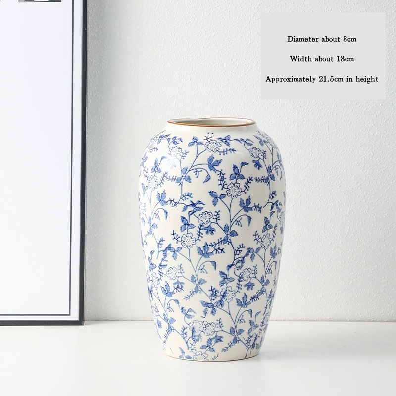 High-end retro-style new Chinese blue and white porcelain vase three-piece set for living room and dining room, floral arrangement, home decoration.