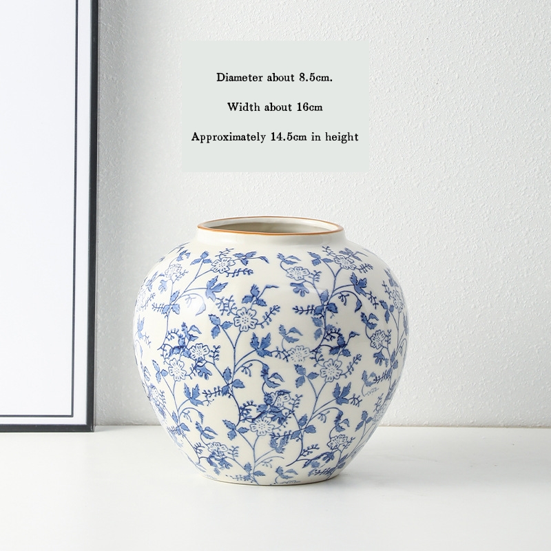 High-end retro-style new Chinese blue and white porcelain vase three-piece set for living room and dining room, floral arrangement, home decoration.