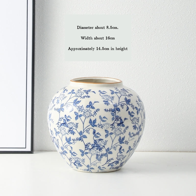 High-end retro-style new Chinese blue and white porcelain vase three-piece set for living room and dining room, floral arrangement, home decoration.
