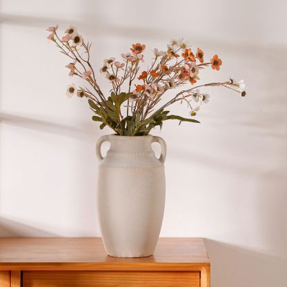 Ornamental flower arrangement, vintage ceramic vase with handles, flower arrangement utensil