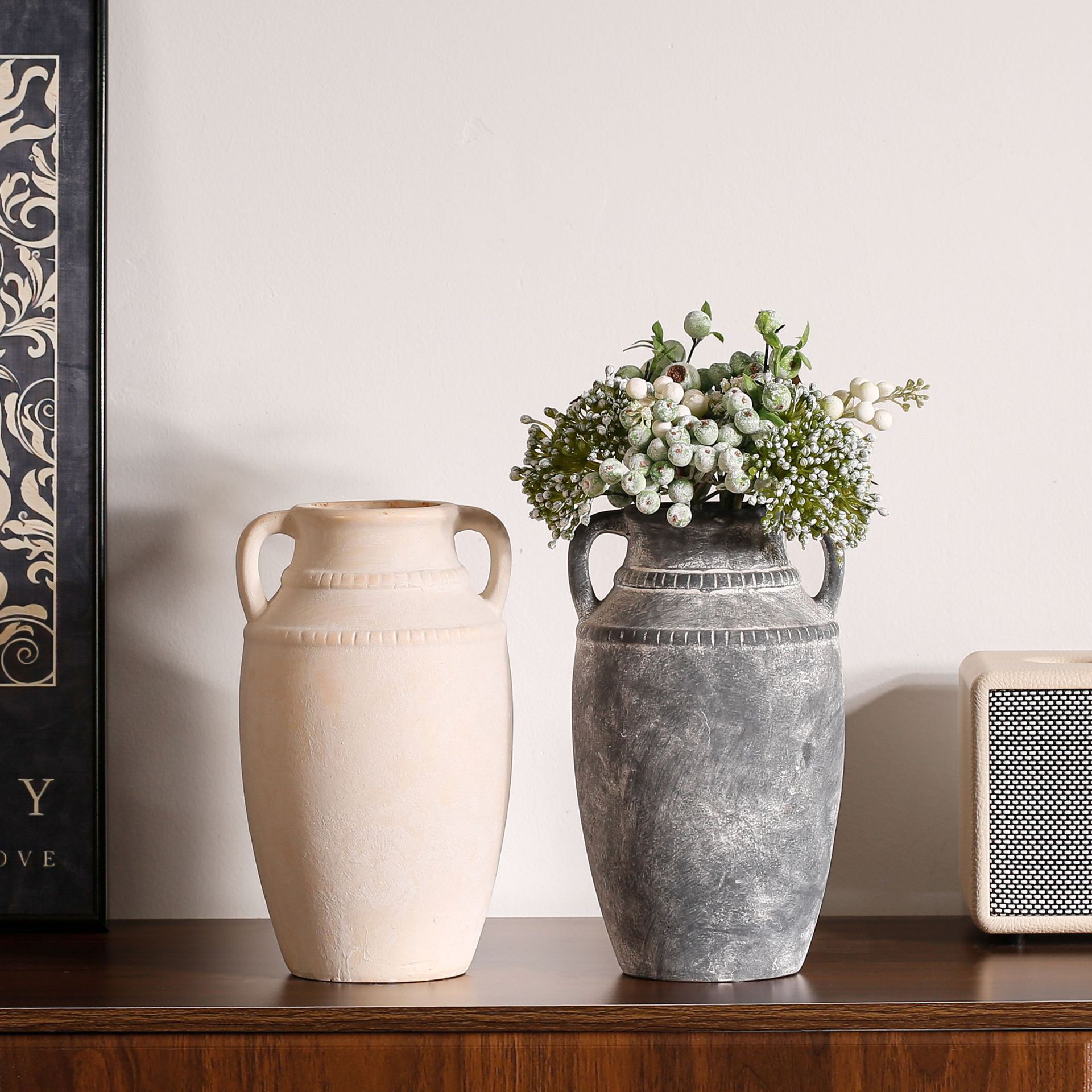 Ornamental flower arrangement, vintage ceramic vase with handles, flower arrangement utensil