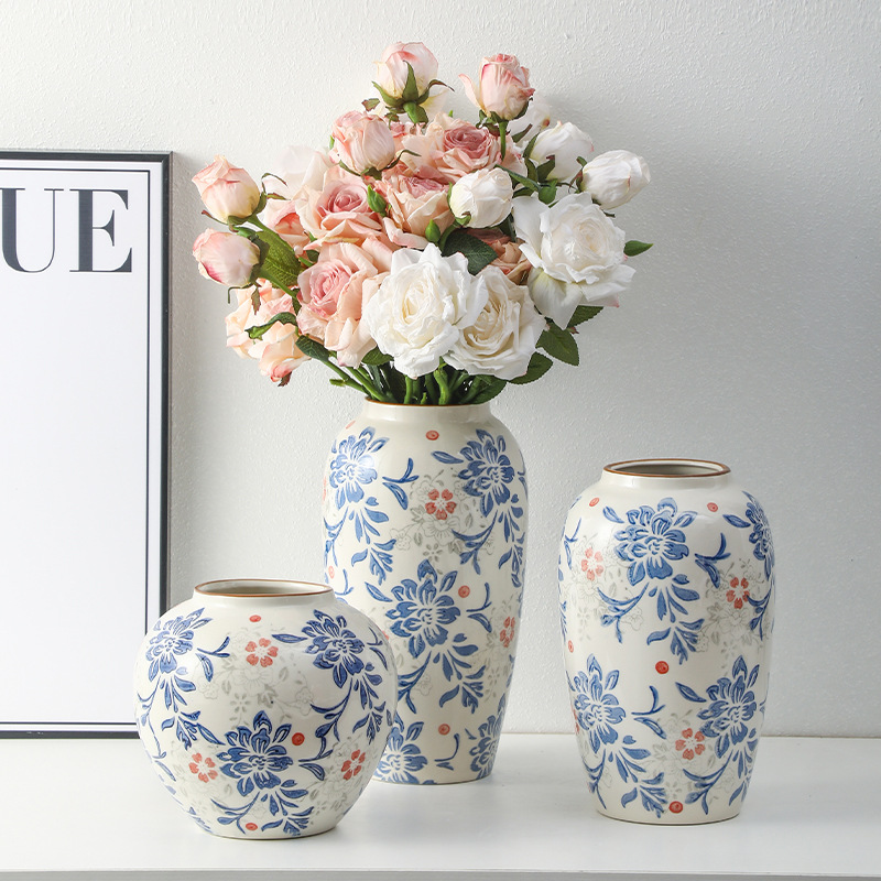 High-end retro-style new Chinese blue and white porcelain vase three-piece set for living room and dining room, floral arrangement, home decoration.