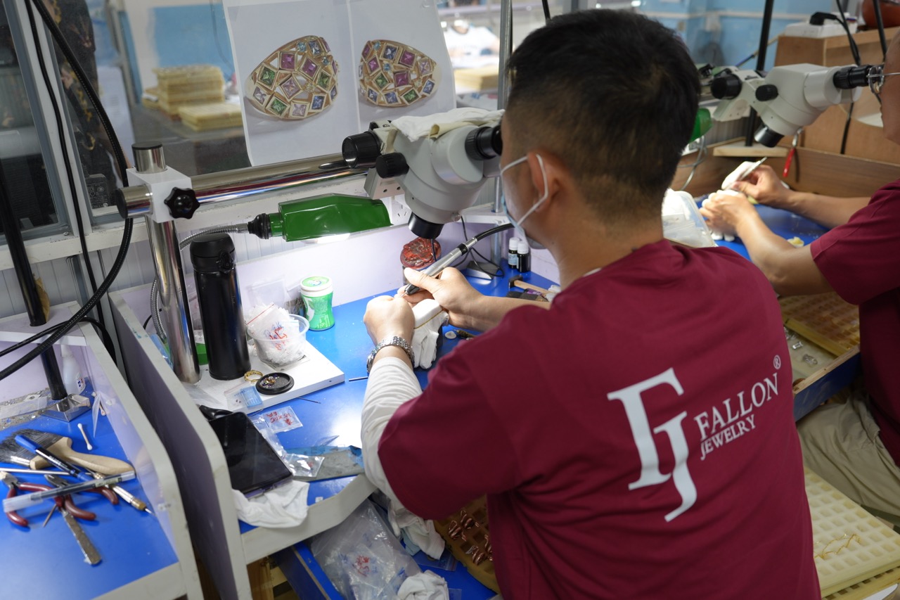 Jewelry craftsmen performing detailed handwork at FJ Fallon Jewelry factory