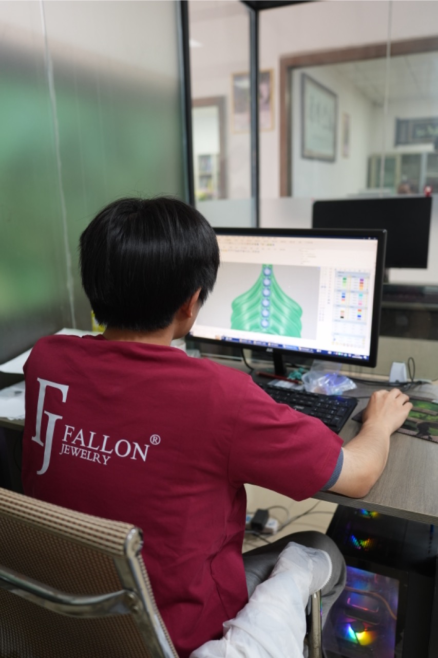 Jewelry CAD designer creating a 3D model for custom jewelry production