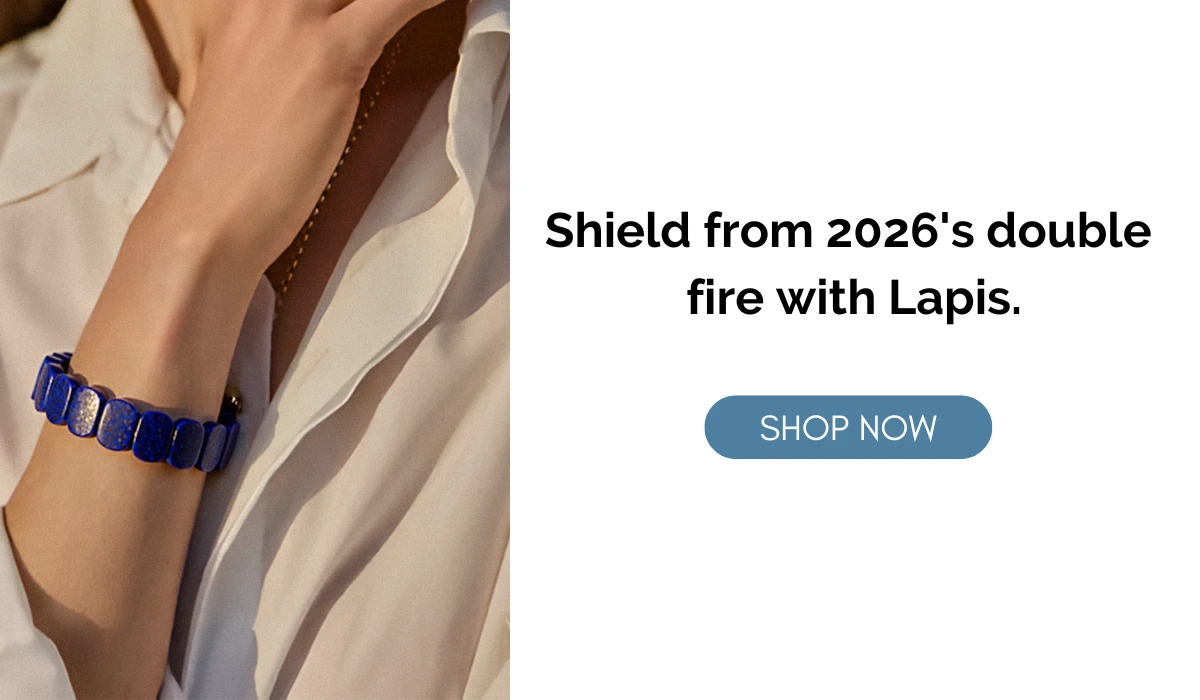 Promotional graphic featuring a lapis lazuli bracelet, with text "Shield from 2026's double fire with Lapis" and a "SHOP NOW" button.