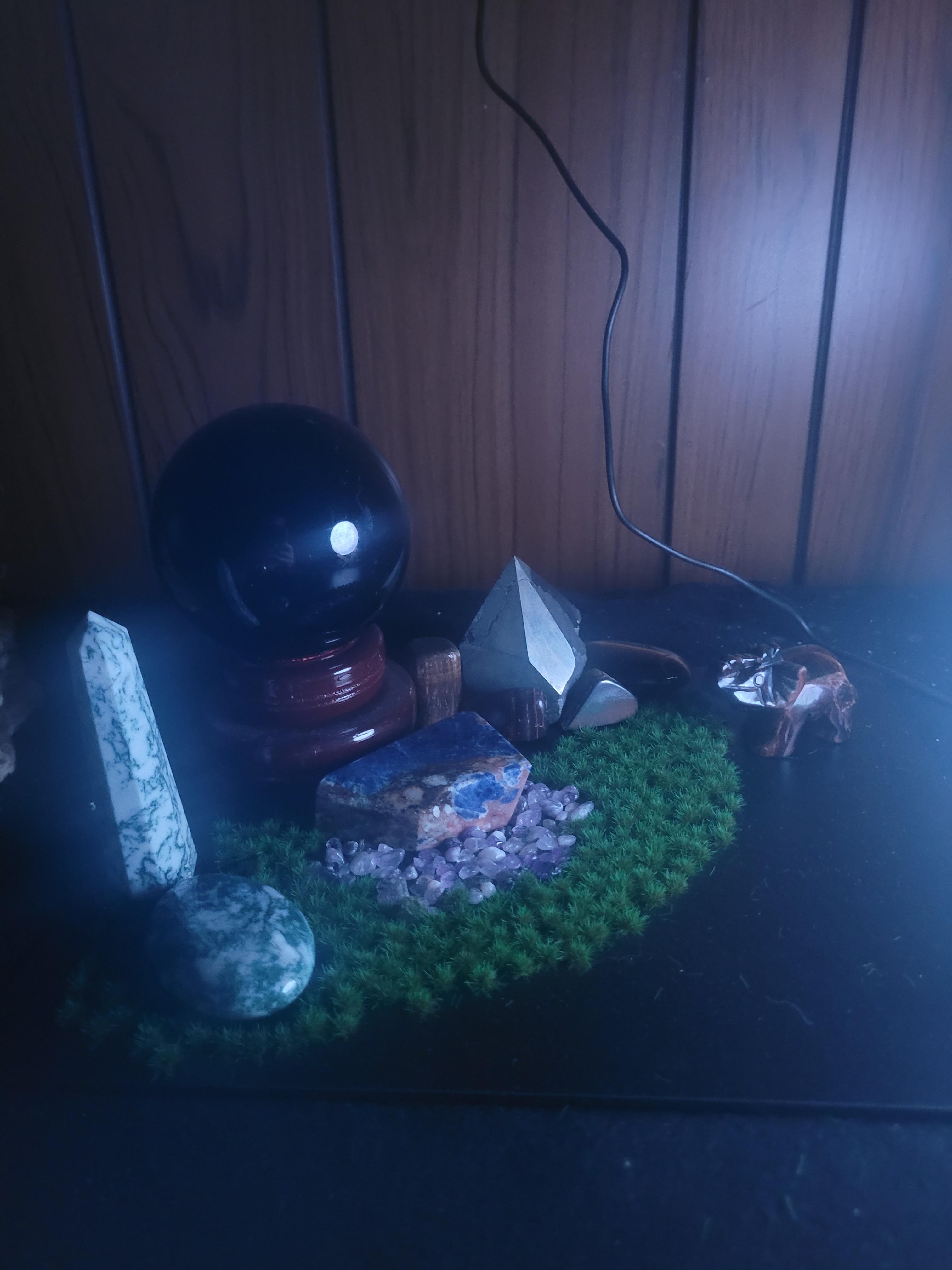 A crystal scene with Tiger's Eye and other gemstones.