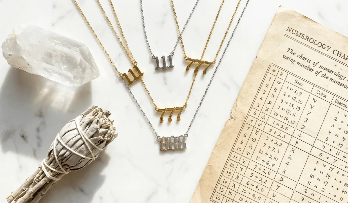 A collection of angel number jewelry featuring 111, 777, and 888 sequences with spiritual healing crystals.