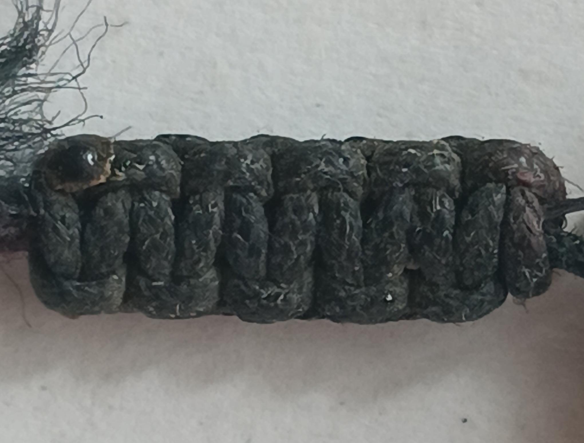 Sacred knot on bodhi seed bracelet from Bodh Gaya.
