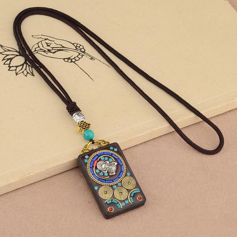 Vintage Ebony Wood Amulet Necklace – 15 Symbolic Designs with Copper Accents & Cotton Cord