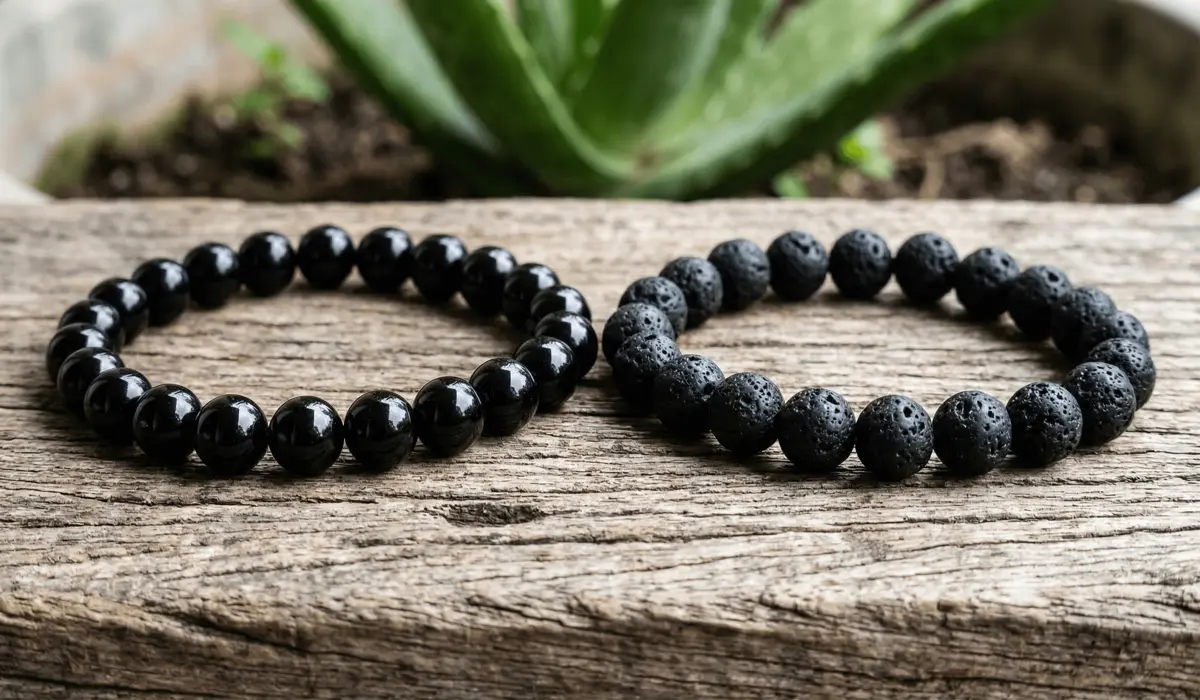 Comparison of Black Obsidian and Lava Stone spiritual bracelets for men, showing the difference in texture and elemental representation.