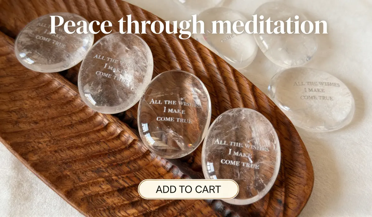 Natural High-Clarity Clear Quartz Palm Stone for Meditation, engraved with "ALL THE WISHES I MAKE COME TRUE", arranged on a carved wooden tray with text "Peace through meditation" and an "ADD TO CART" button overlay.
