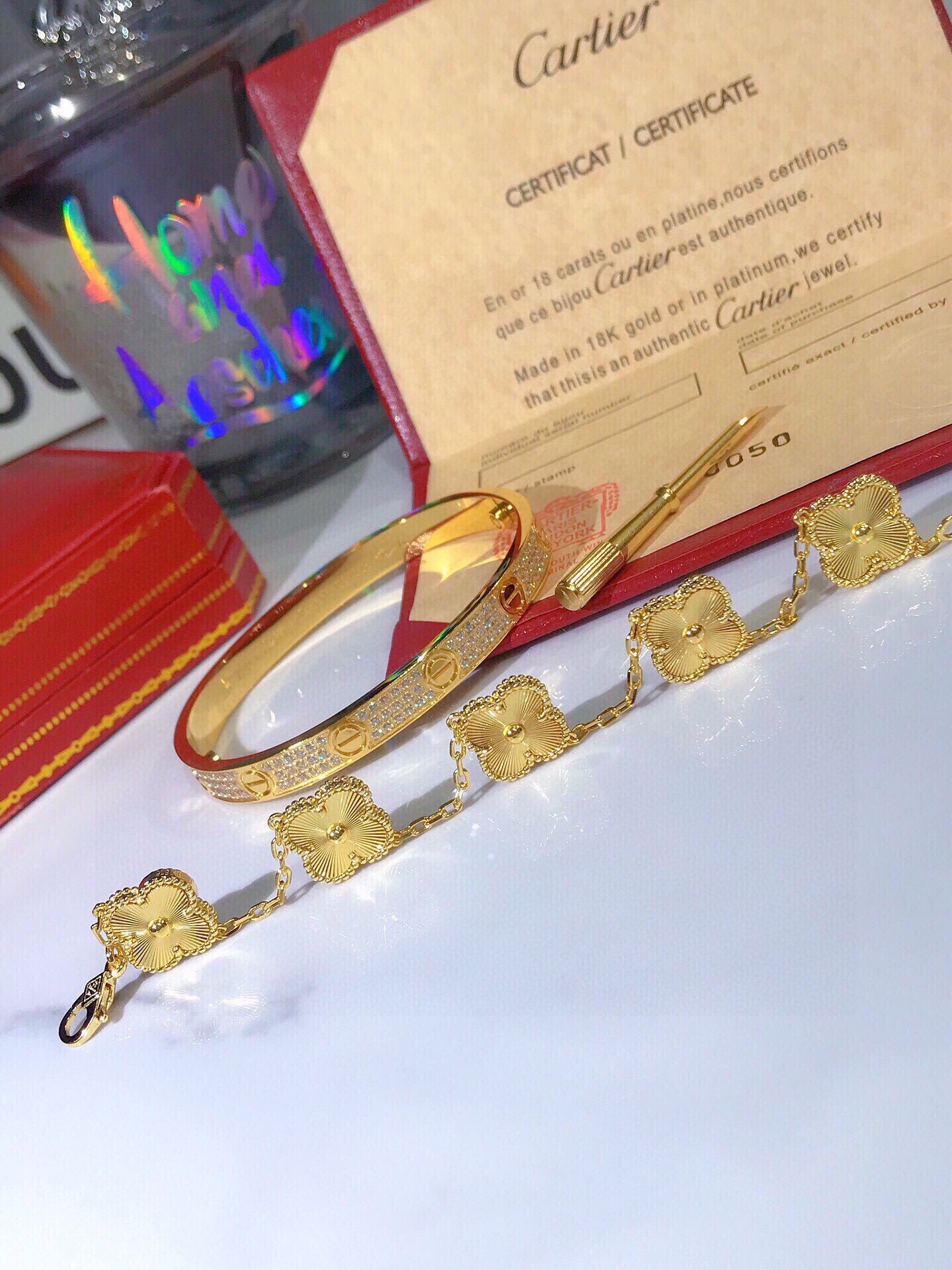 LOVE BRACELET, DIAMOND-PAVED + Vintage Alhambra bracelet, 5 motifs