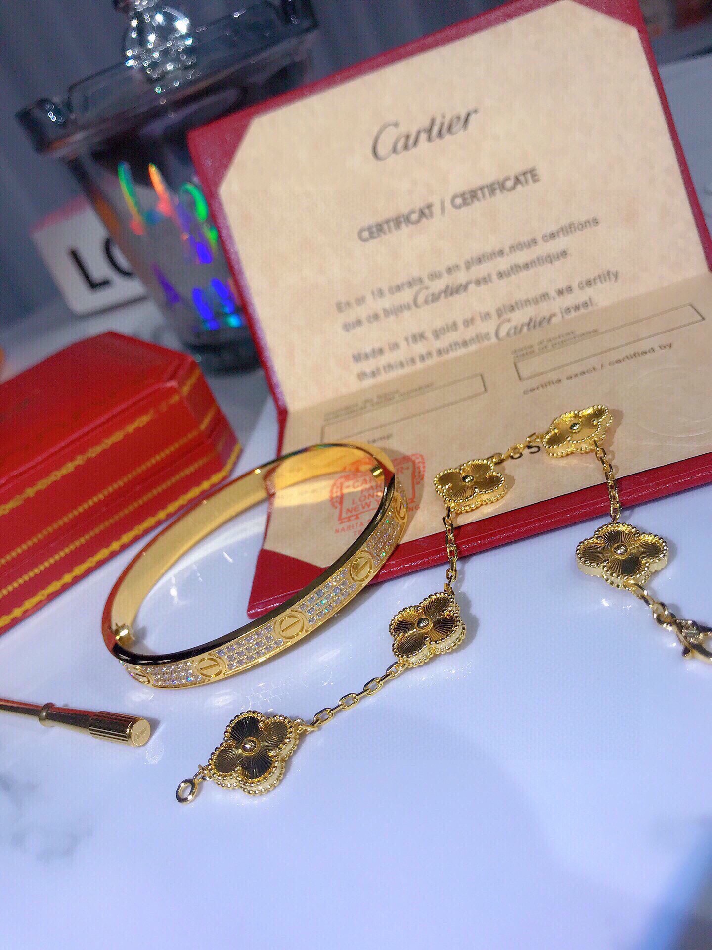 LOVE BRACELET, DIAMOND-PAVED + Vintage Alhambra bracelet, 5 motifs