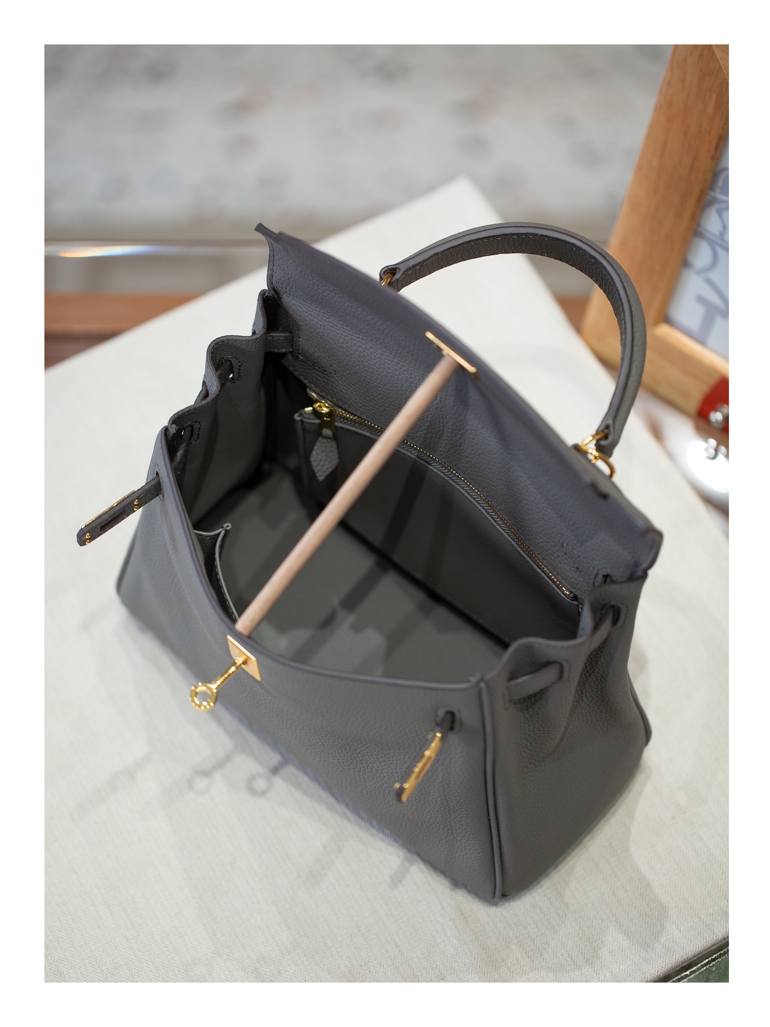 KELLY 25 FIRST LAYER TOGO COWHIDE GREY
