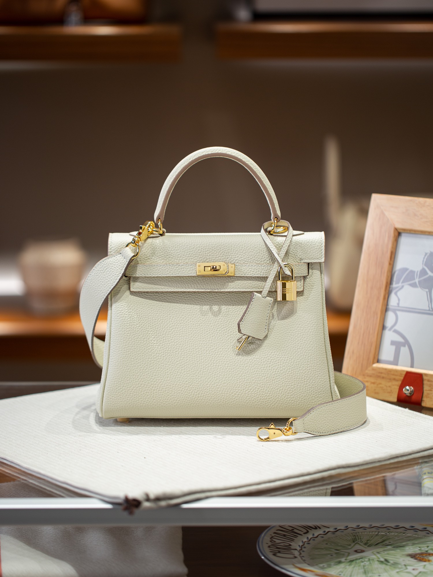 KELLY 25 FIRST LAYER TOGO COWHIDE WHITE