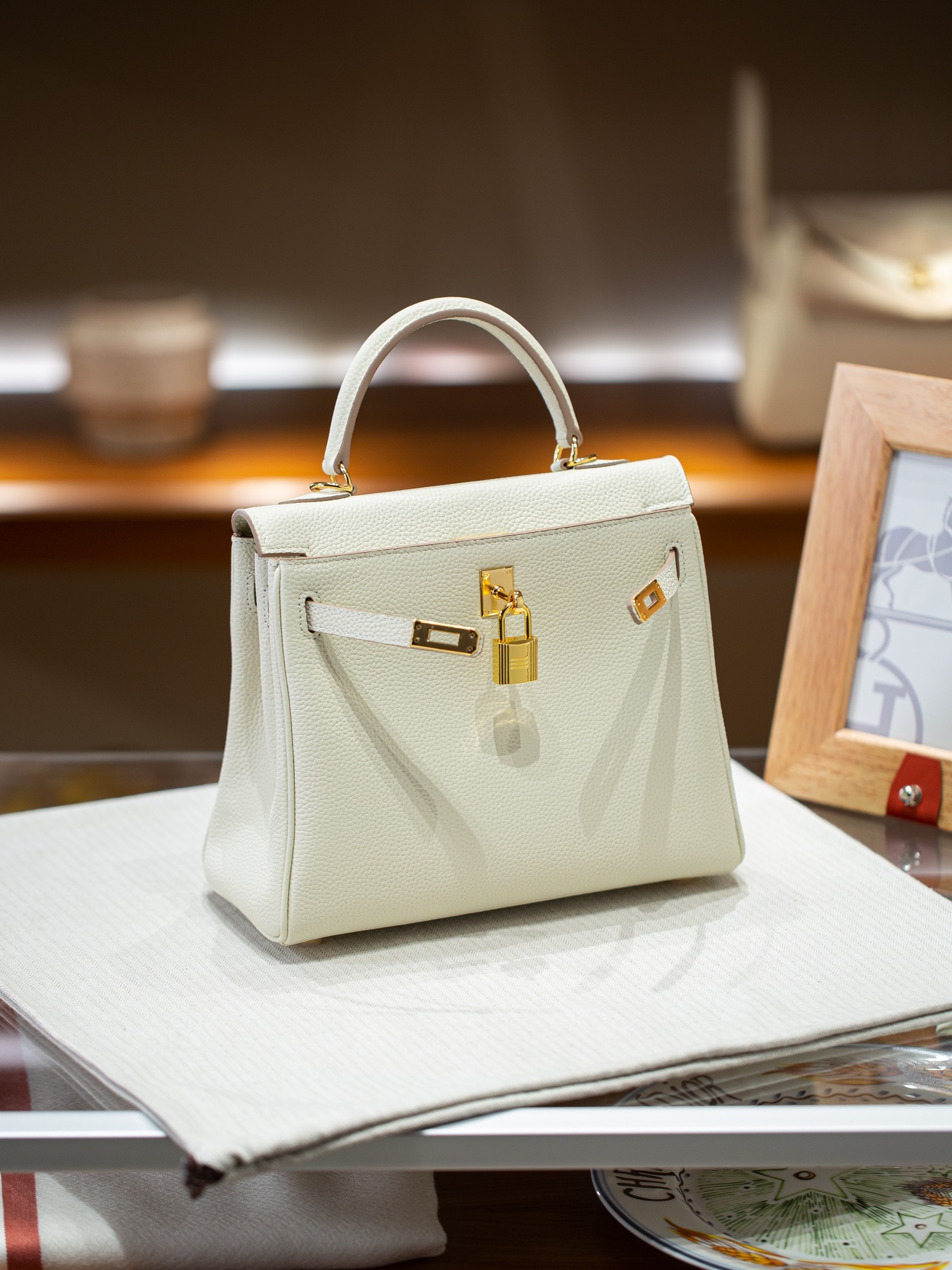 KELLY 25 FIRST LAYER TOGO COWHIDE WHITE