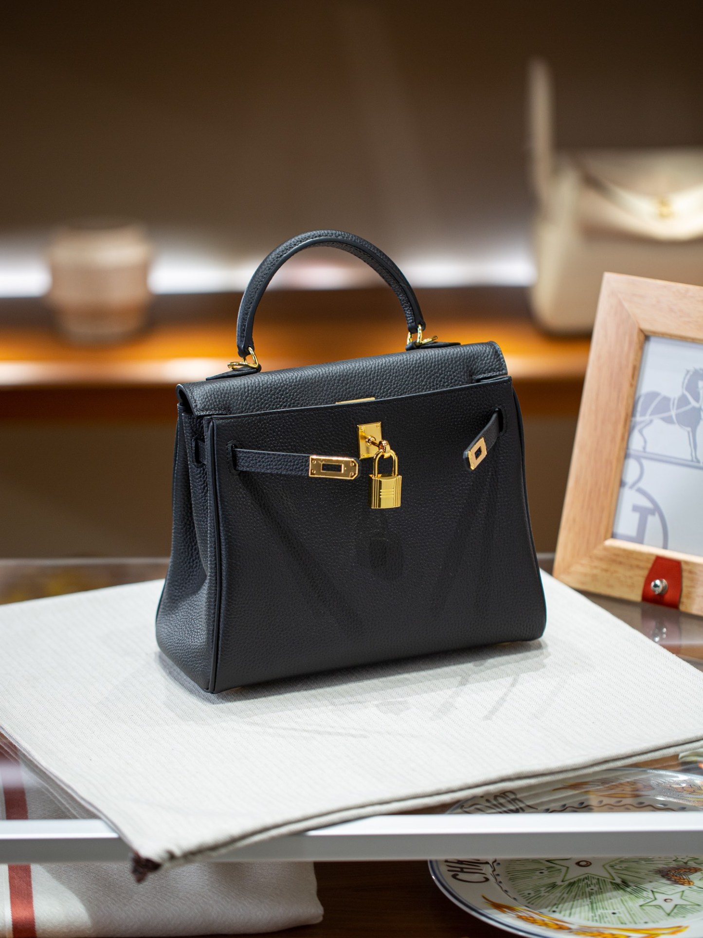 KELLY 25 FIRST LAYER TOGO COWHIDE BLACK