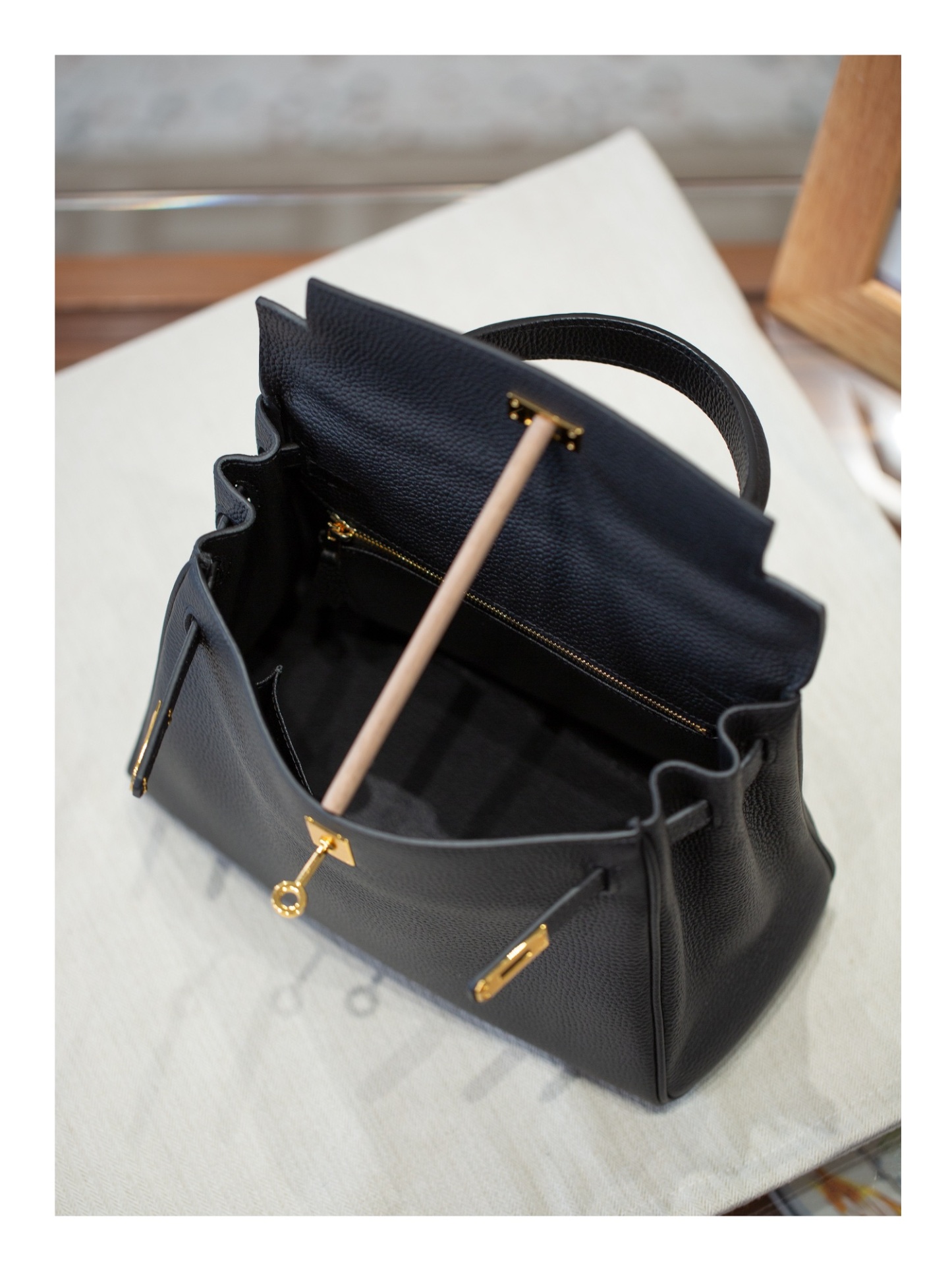 KELLY 25 FIRST LAYER TOGO COWHIDE BLACK