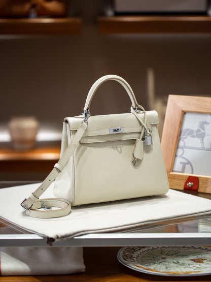 KELLY 25 FIRST LAYER TOGO COWHIDE WHITE