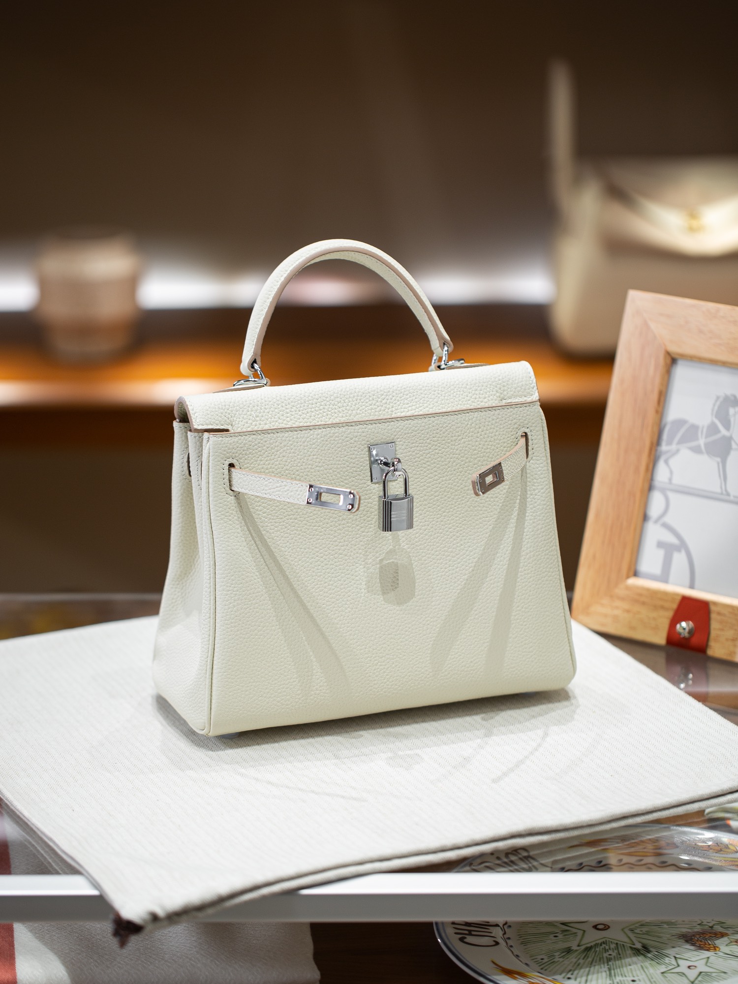 KELLY 25 FIRST LAYER TOGO COWHIDE WHITE