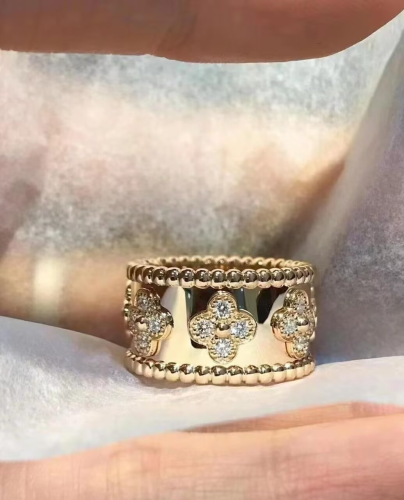 Four-leaf clover ring with embedded stones (women's)