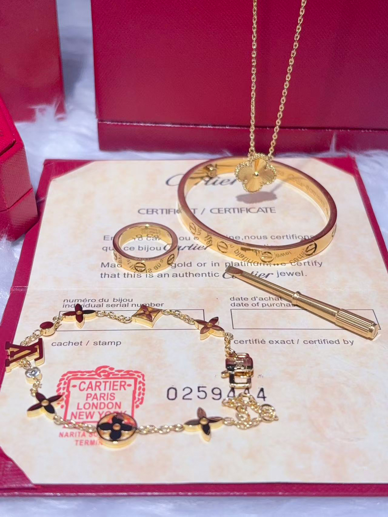 LOVE BRACELET + LOVE RING + VINTAGE ALHAMBRA PENDANT + IDYLLE BLOSSOM MONOGRAM BRACELET, YELLOW GOLD AND DIAMONDS