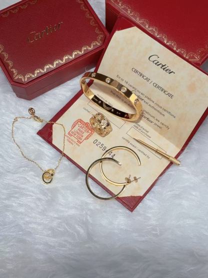 LOVE BRACELET, 10 DIAMONDS + LOVE EARRINGS + VINTAGE ALHAMBRA PENDANT + IDYLLE BLOSSOM MONOGRAM BRACELET, YELLOW GOLD AND DIAMONDS