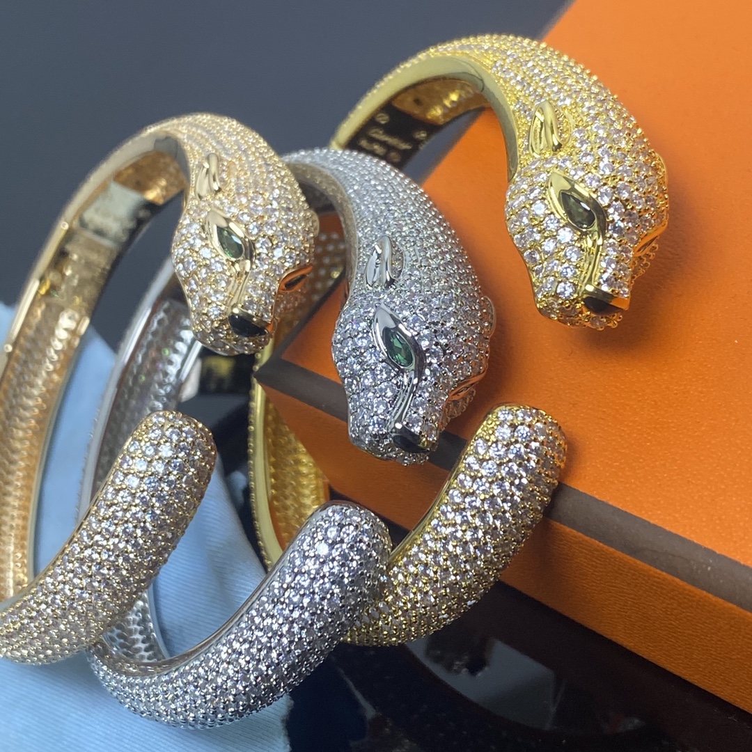 Panthère de Carthttier bracelet, diamond-studded Yellow gold, rose gold, white gold, onyx, emeralds, diamonds