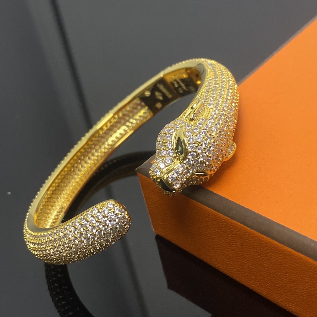 Panthère de Carthttier bracelet, diamond-studded Yellow gold, rose gold, white gold, onyx, emeralds, diamonds
