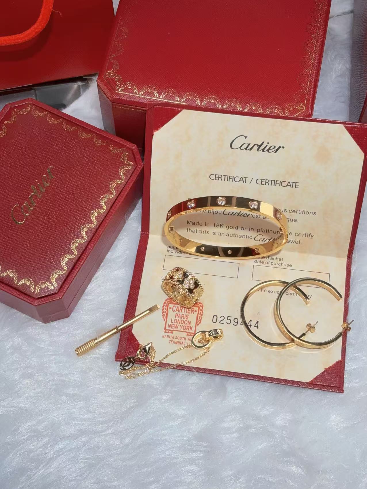 LOVE BRACELET, 10 DIAMONDS + LOVE EARRINGS + VINTAGE ALHAMBRA PENDANT + IDYLLE BLOSSOM MONOGRAM BRACELET, YELLOW GOLD AND DIAMONDS