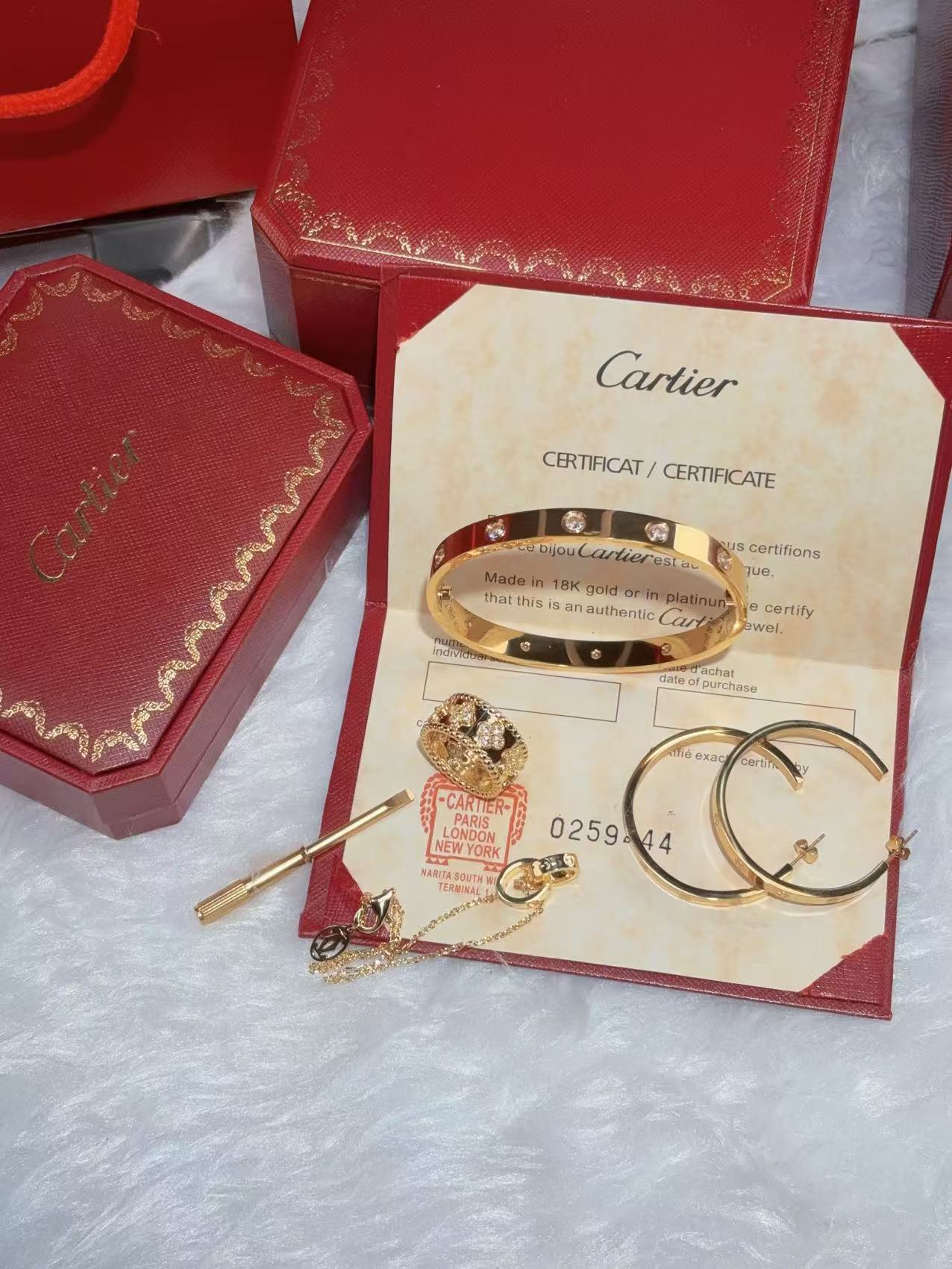 LOVE BRACELET, 10 DIAMONDS + LOVE EARRINGS + VINTAGE ALHAMBRA PENDANT + IDYLLE BLOSSOM MONOGRAM BRACELET, YELLOW GOLD AND DIAMONDS