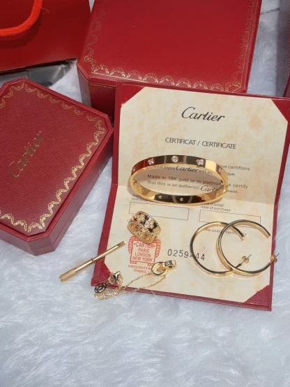 LOVE BRACELET, 10 DIAMONDS + LOVE EARRINGS + VINTAGE ALHAMBRA PENDANT + IDYLLE BLOSSOM MONOGRAM BRACELET, YELLOW GOLD AND DIAMONDS