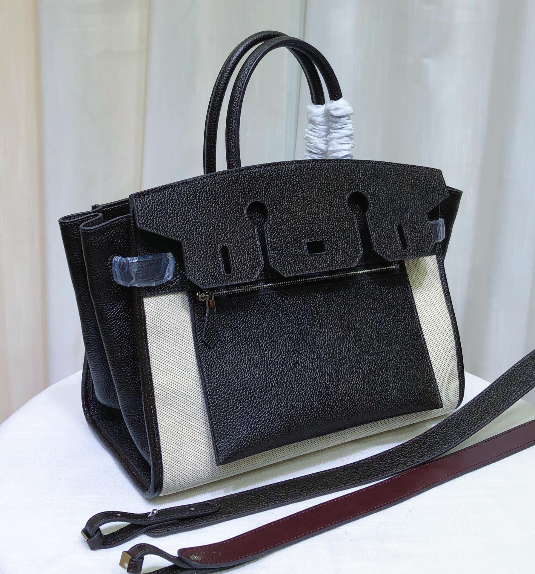 Leather Saddle Bag With Contrast Stitching, Exterior